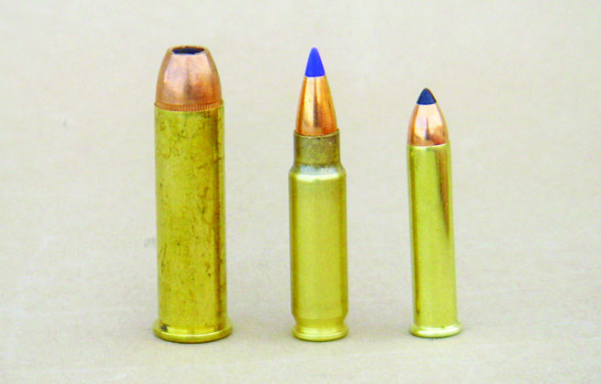 The FN 5.7x28mm cartridge (center) features a bottleneck case and utilizes .224-inch bullets. For size comparison the .357 Magnum (left) and .22 Winchester Magnum (right) are shown.